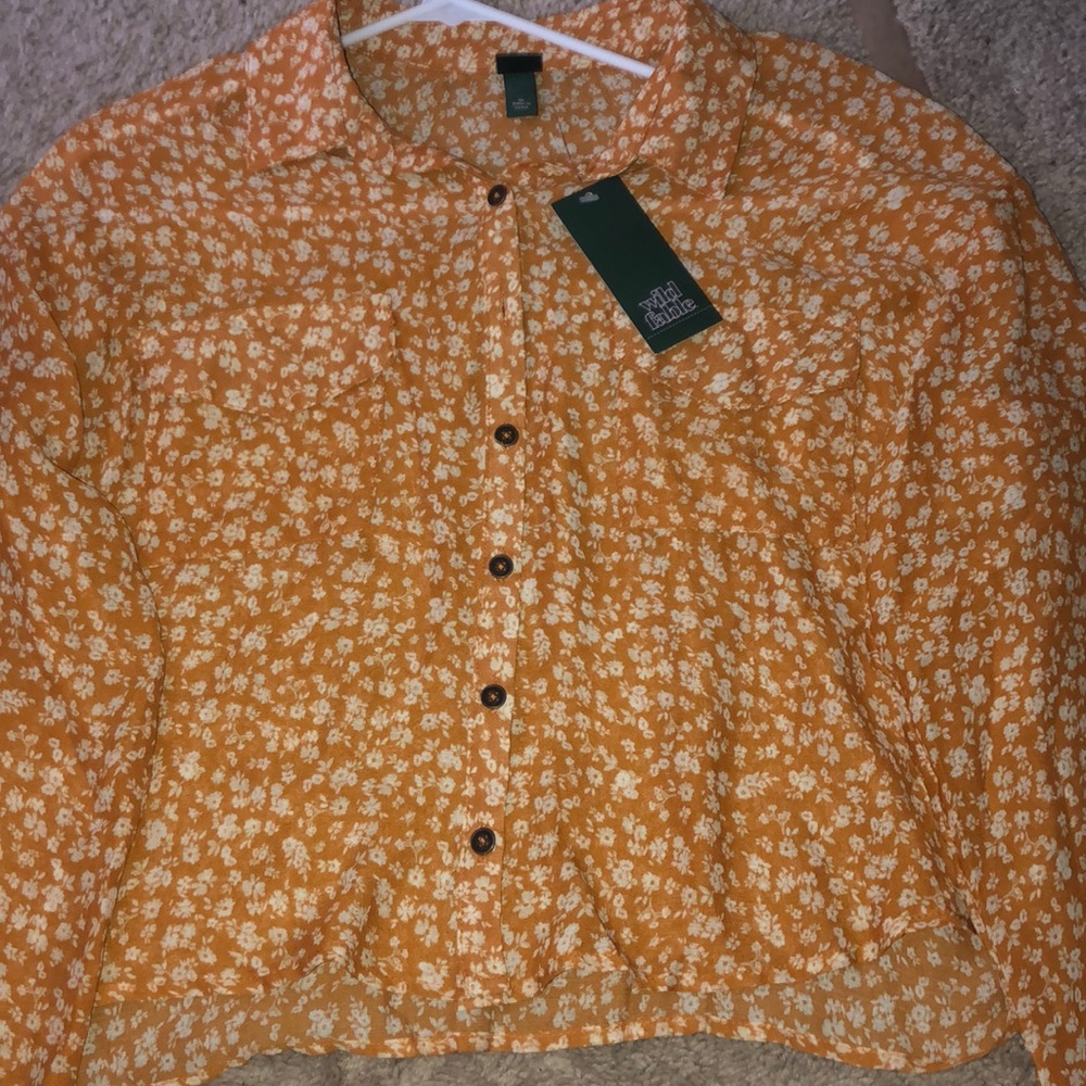 Yellow Blouse with White Flowers as Decor